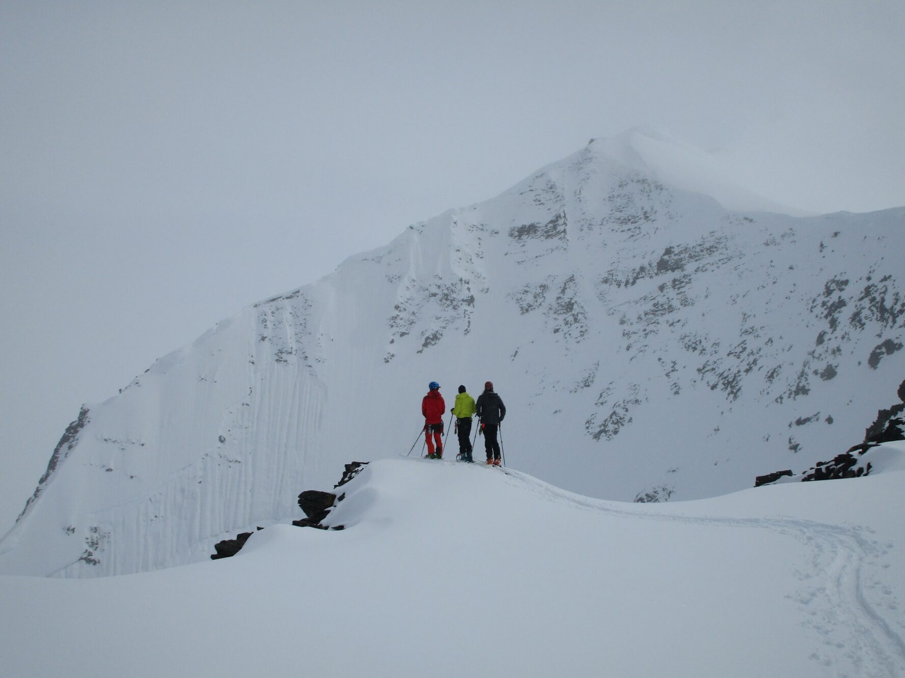 Three skiers in Chugach