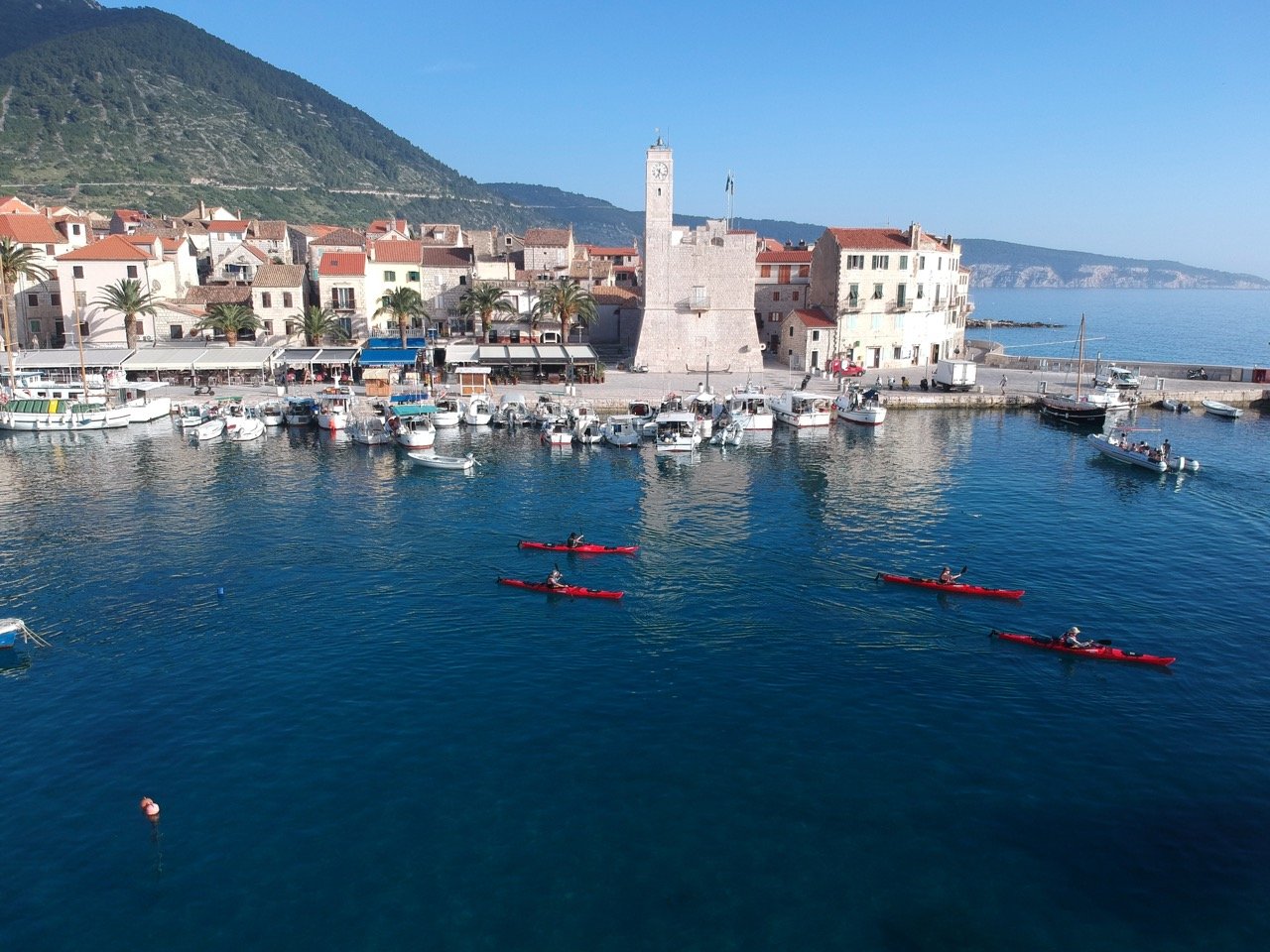 Approaching Komiža with kayaks