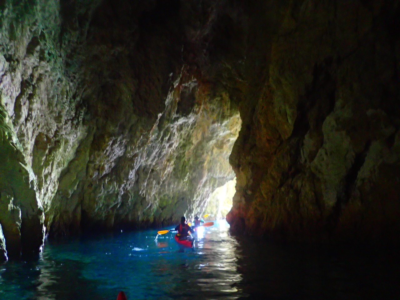 Kayaker exploring a cave