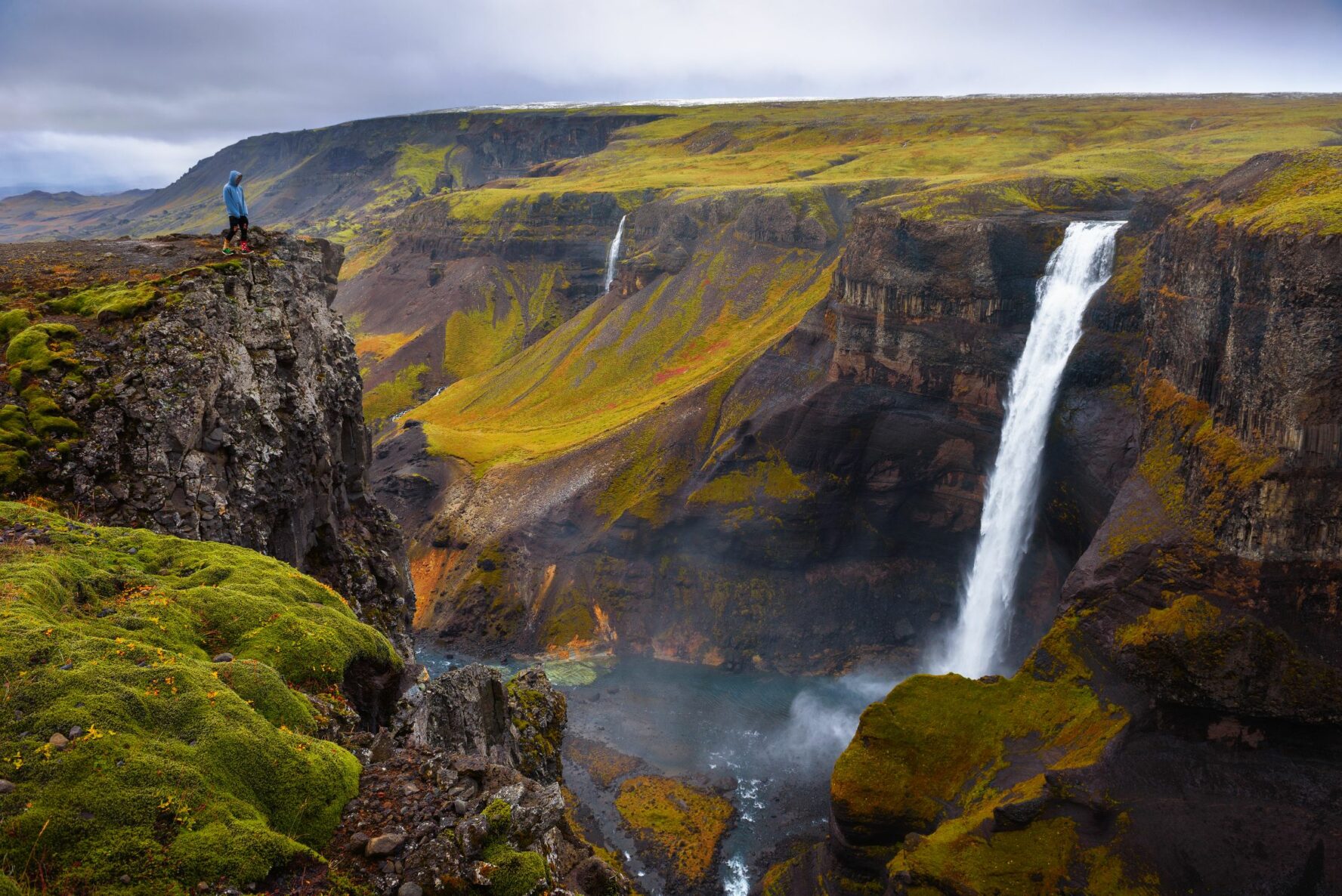 Haifoss waterfall and a dramatic canyon in Iceland.