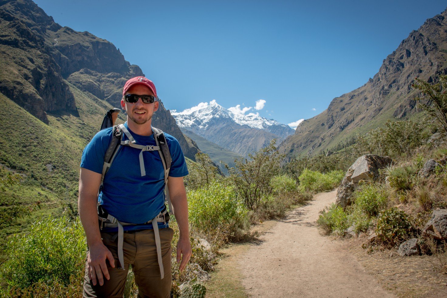 A hiker posing for a photo on the Inca Trail to Machu Picchu, Peru.