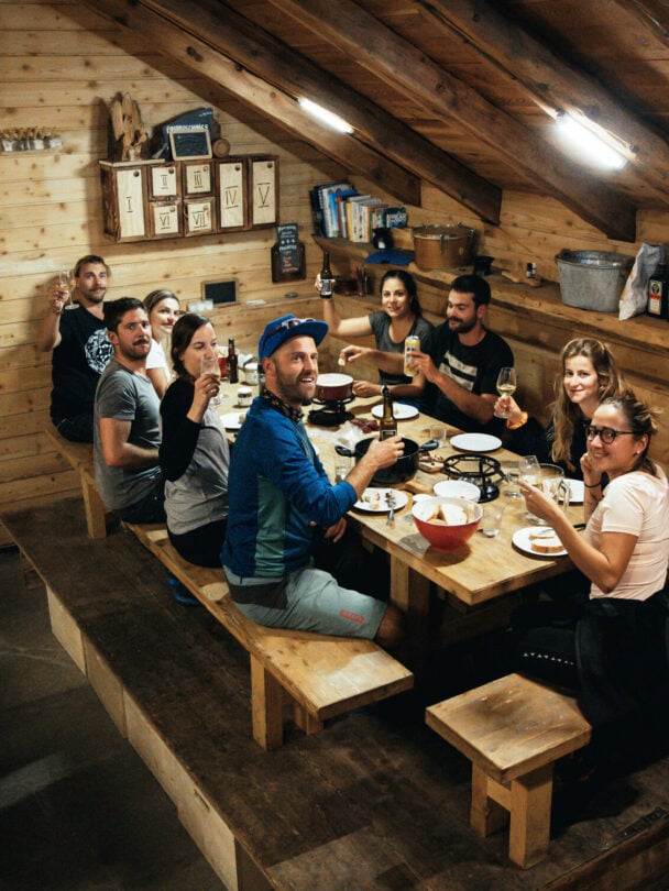 E-mountain bikers near Matterhorn, Swiss Alps.