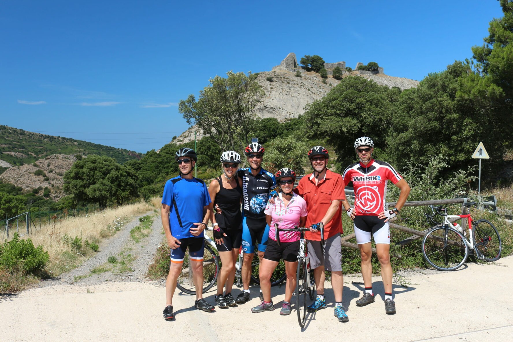 Sardinia, group of cyclists on gravel