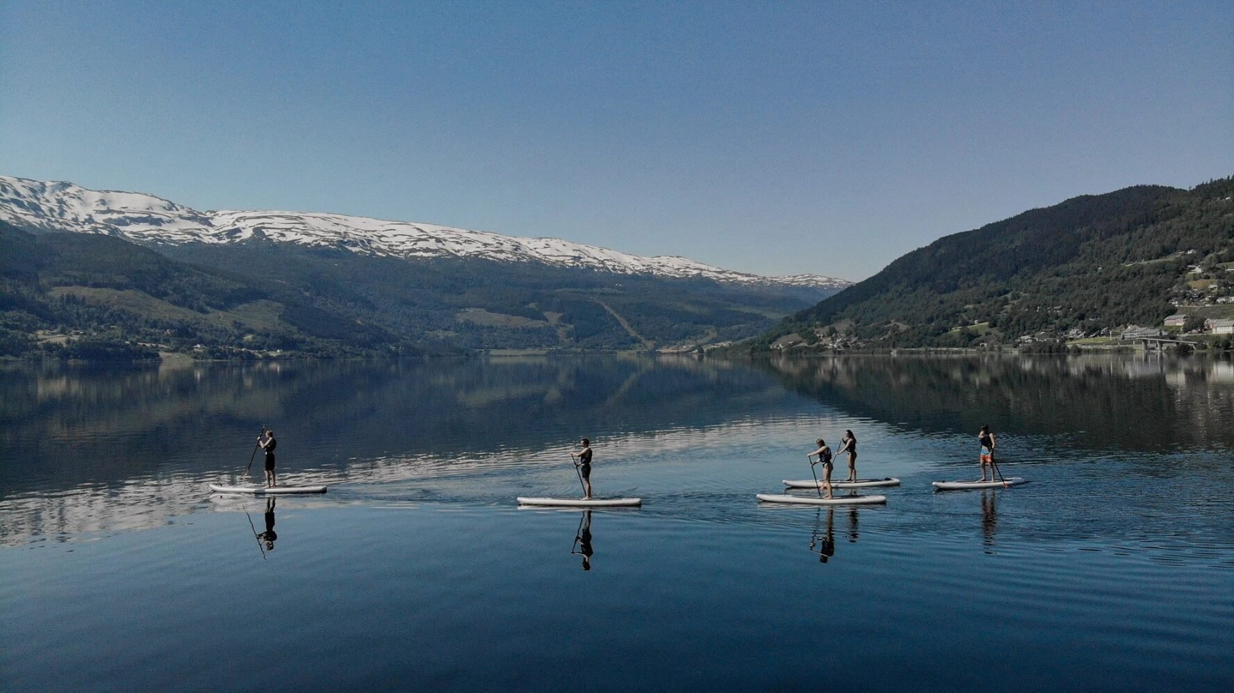 Stand up paddleboarding in Norway