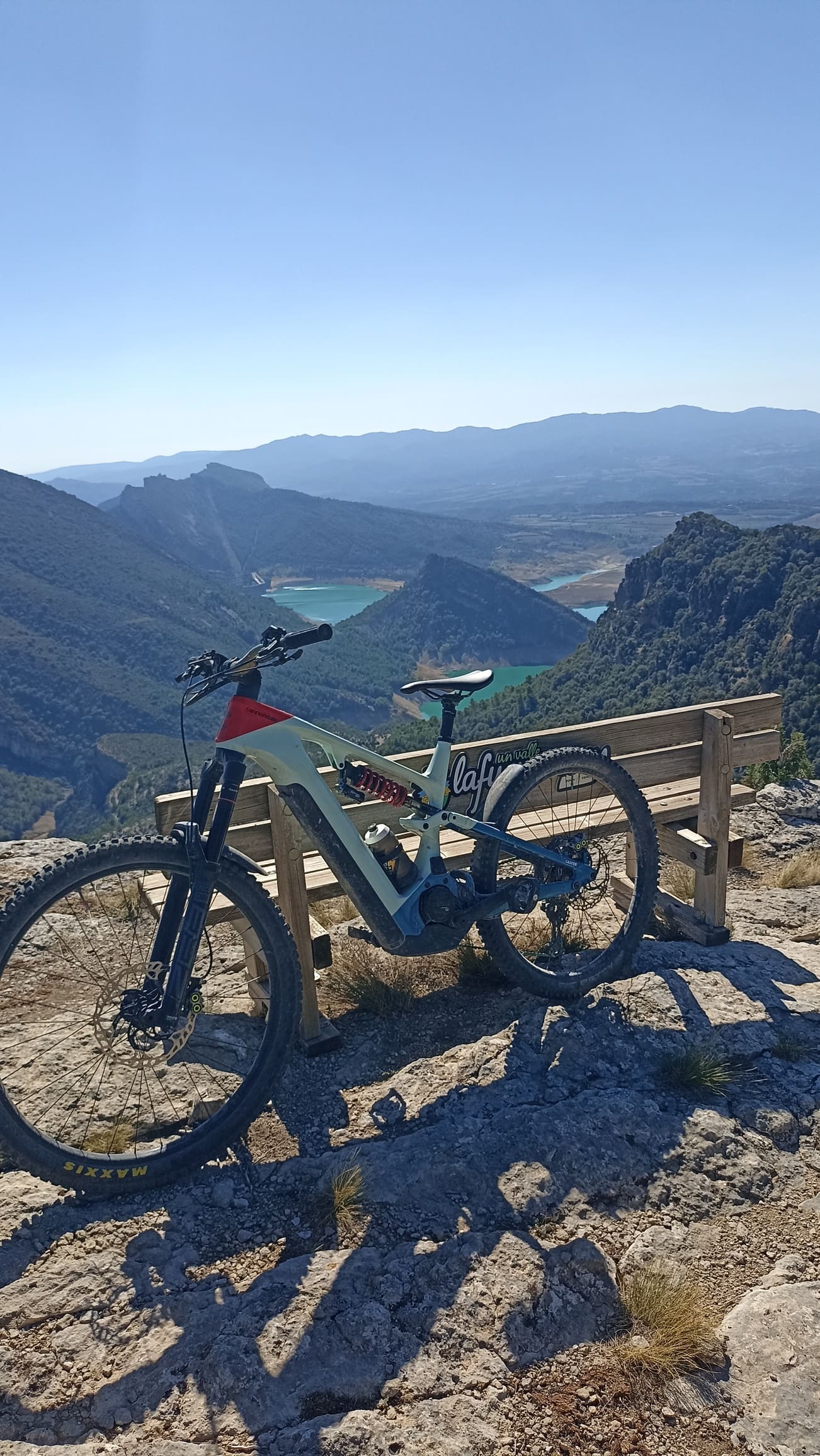 Bike above a lake in the Pyrenees