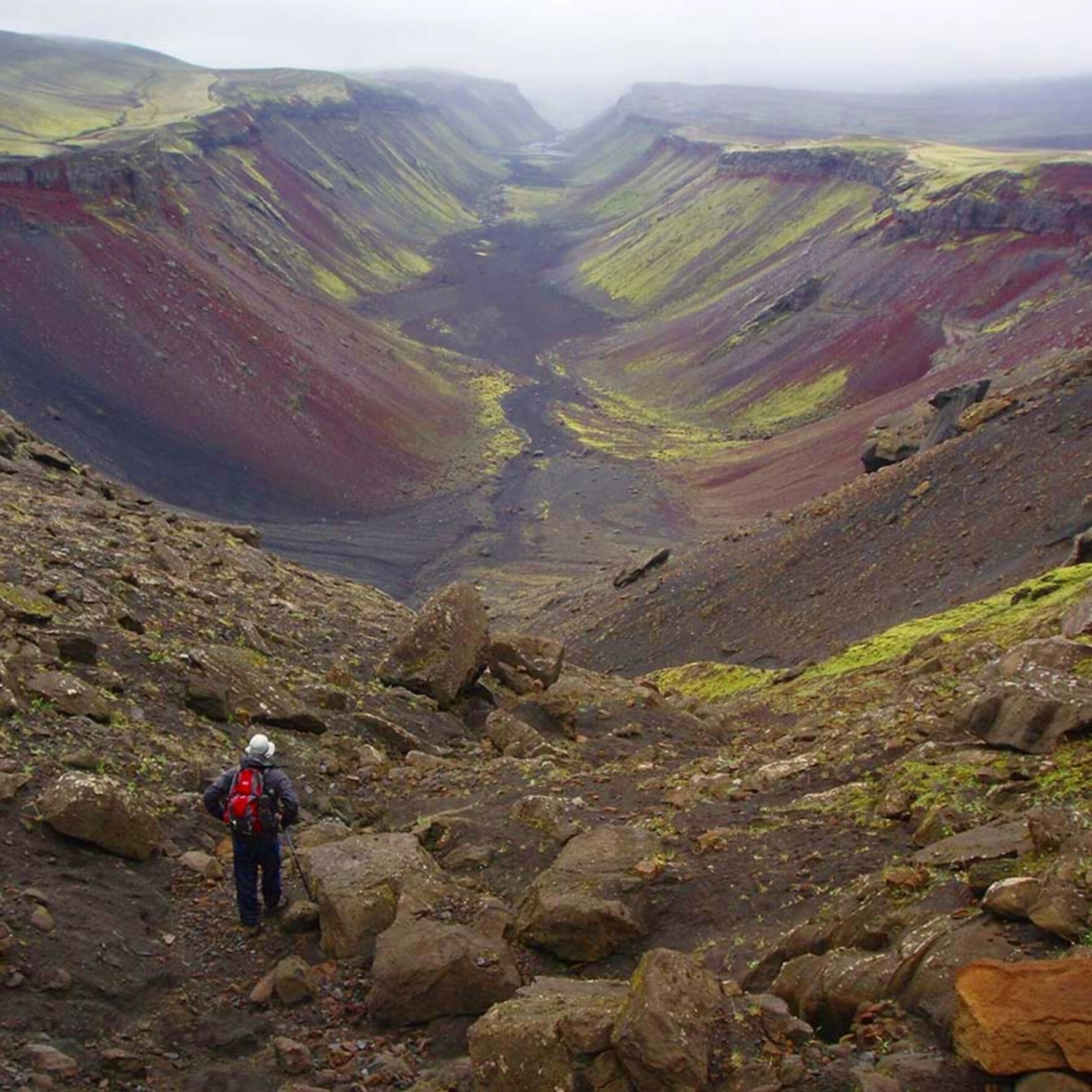 A hiker admiring the view above the Eldgja Canyon.