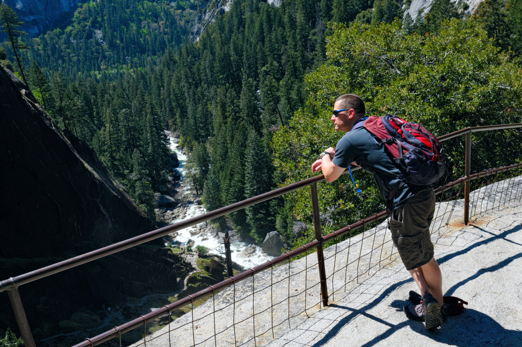 Hiker enjoying the scenery above Vernal Falls, Yosemite.
