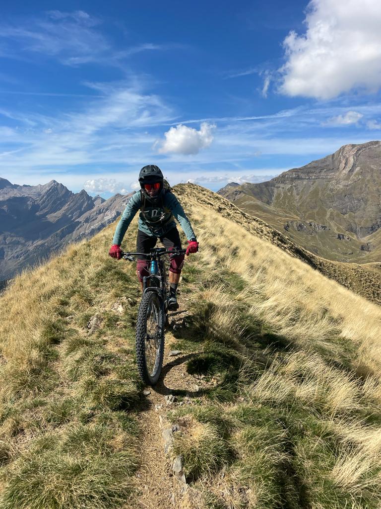 Mountain biker on a peak in Spain
