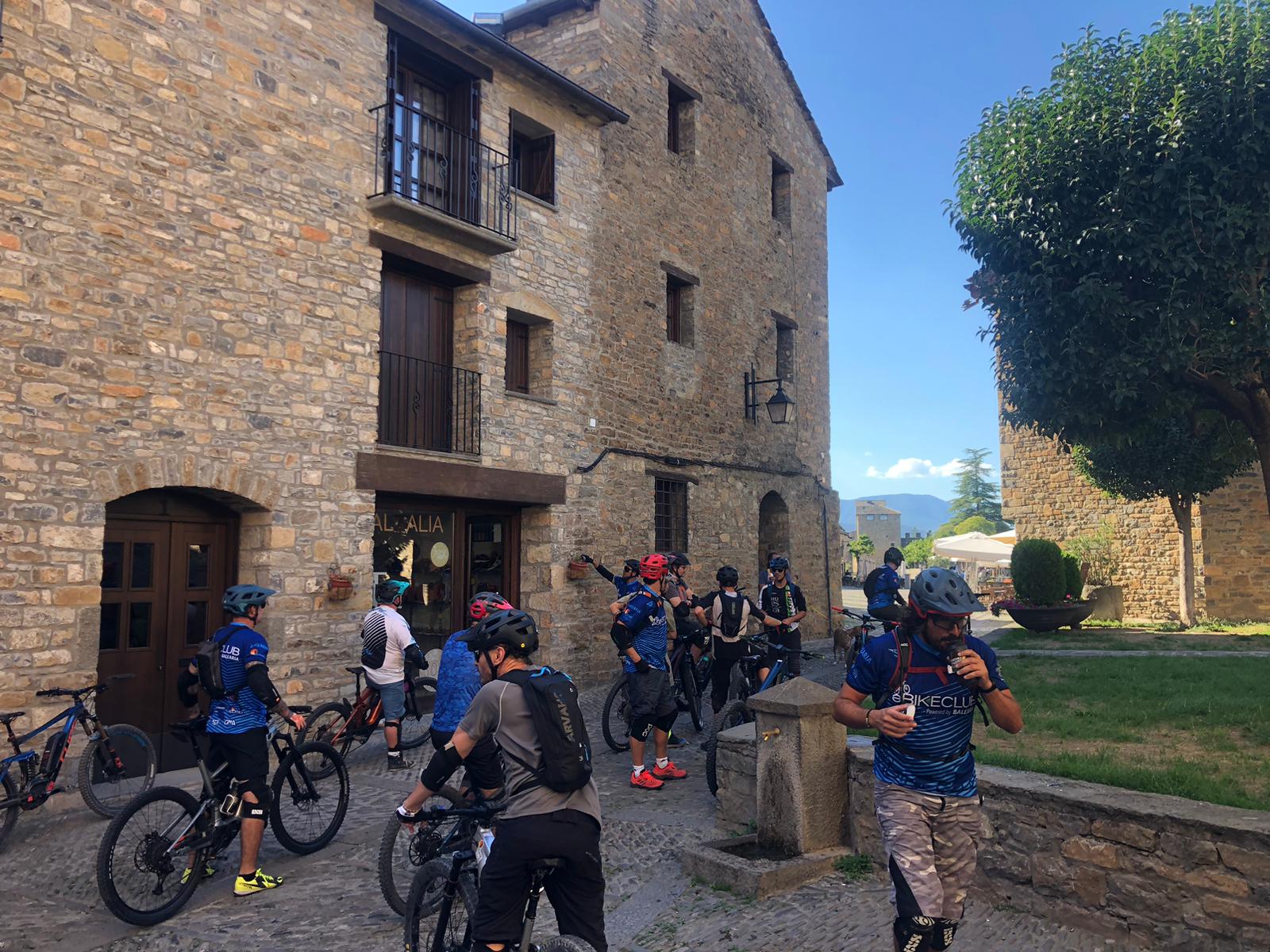 Mountain bikers taking a break in town