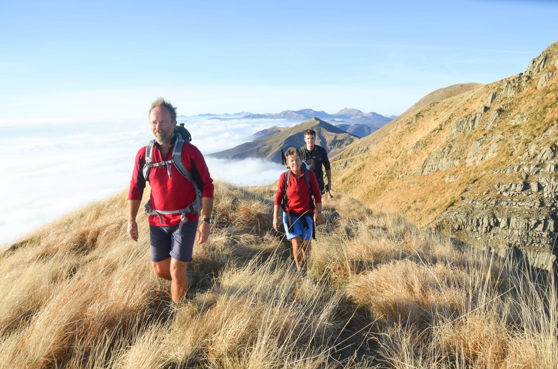 Three hikers Tuscany