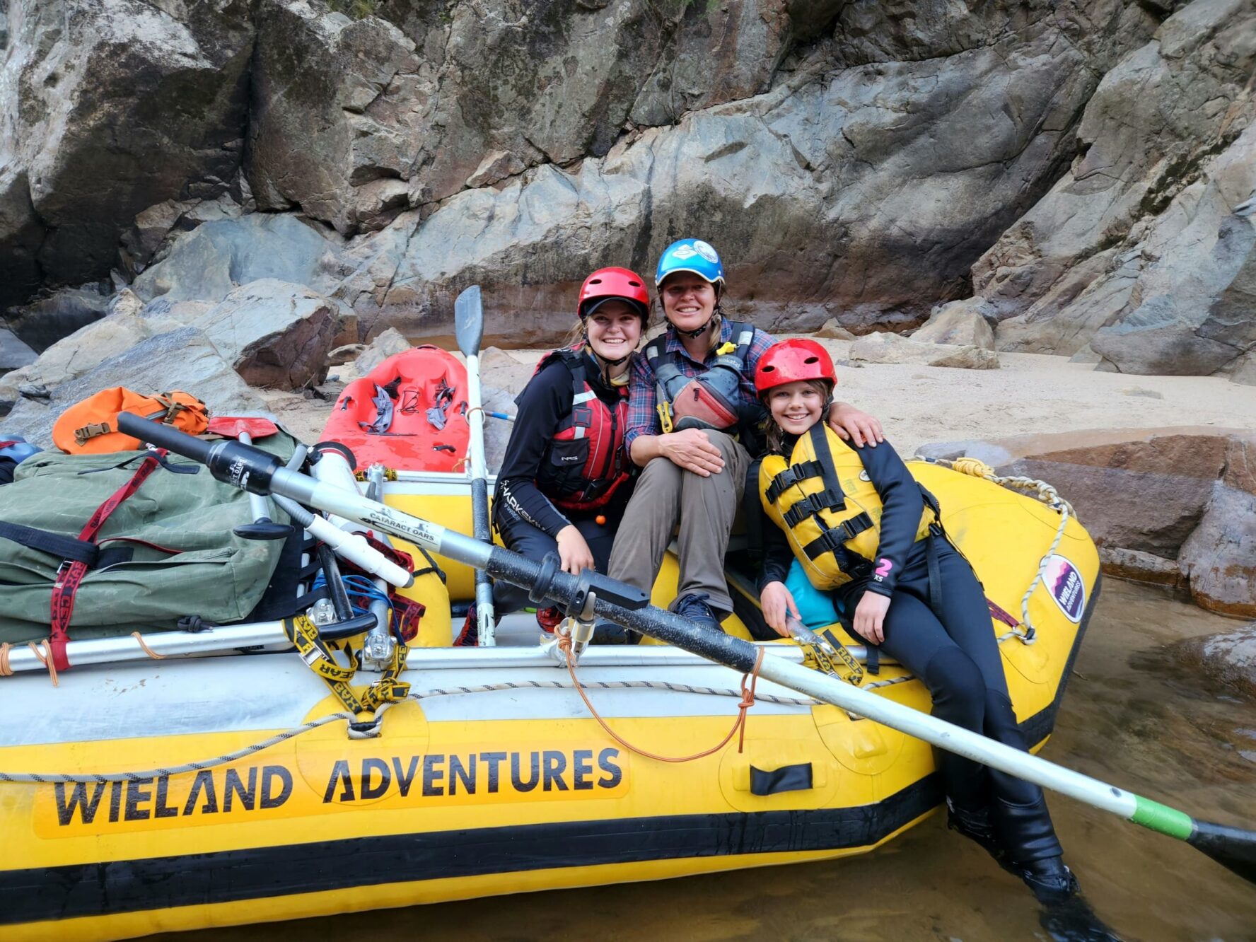 Three participants of the Snowy River rafting