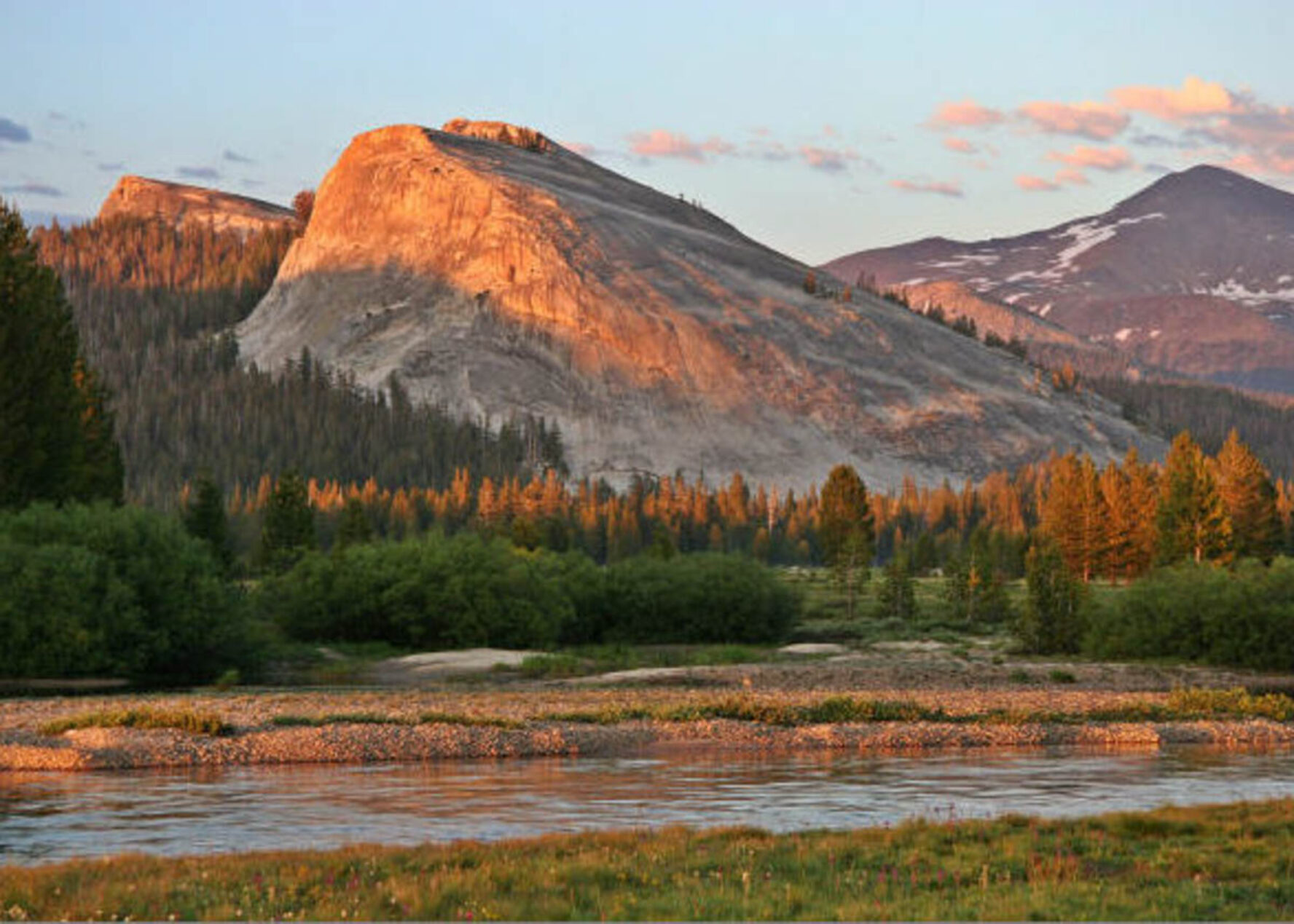 Lembert Dome seen from the Tuolumne Meadows during golden hour.