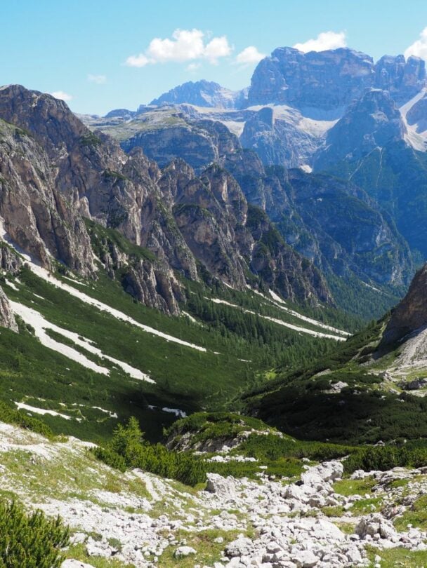 Hiker near Torre Grande in the Dolomites.