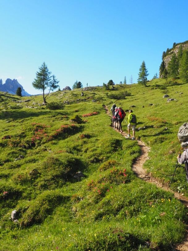 Hiker near Torre Grande in the Dolomites.