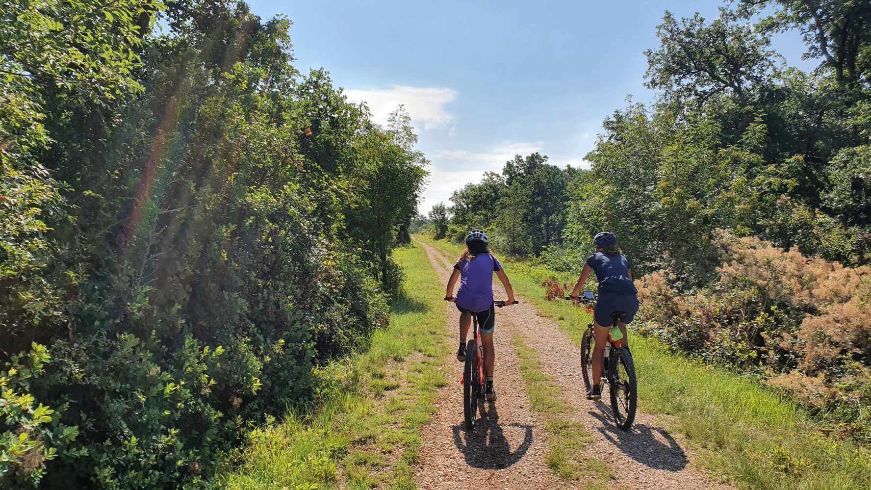 Cyclist on a gravel road in Istria, Croatia.