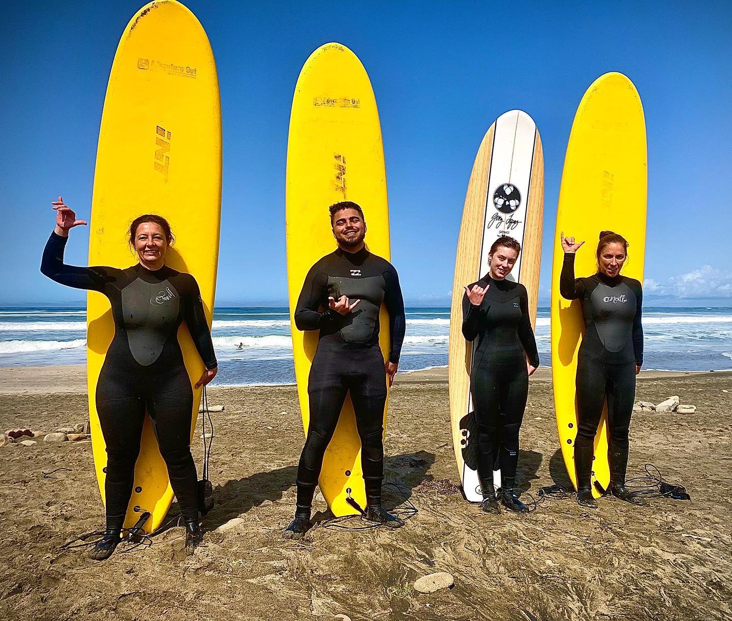 Four surfers in the Bay Area