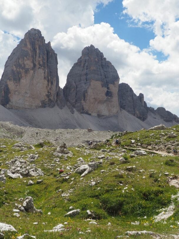 Hiker near Torre Grande in the Dolomites.