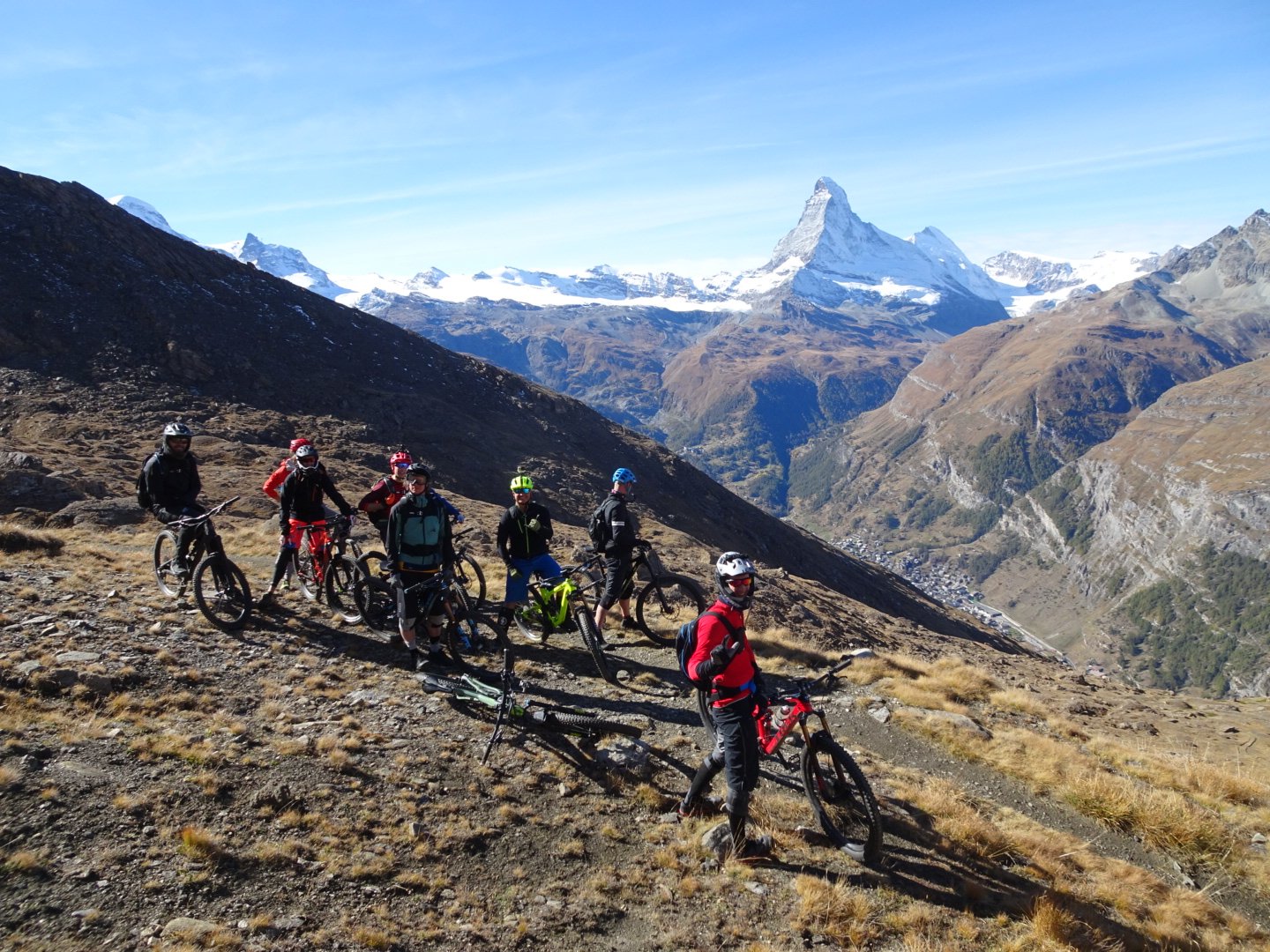 Matterhorn background and a happy group