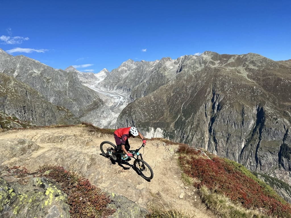 Mountain biker in the high Alps