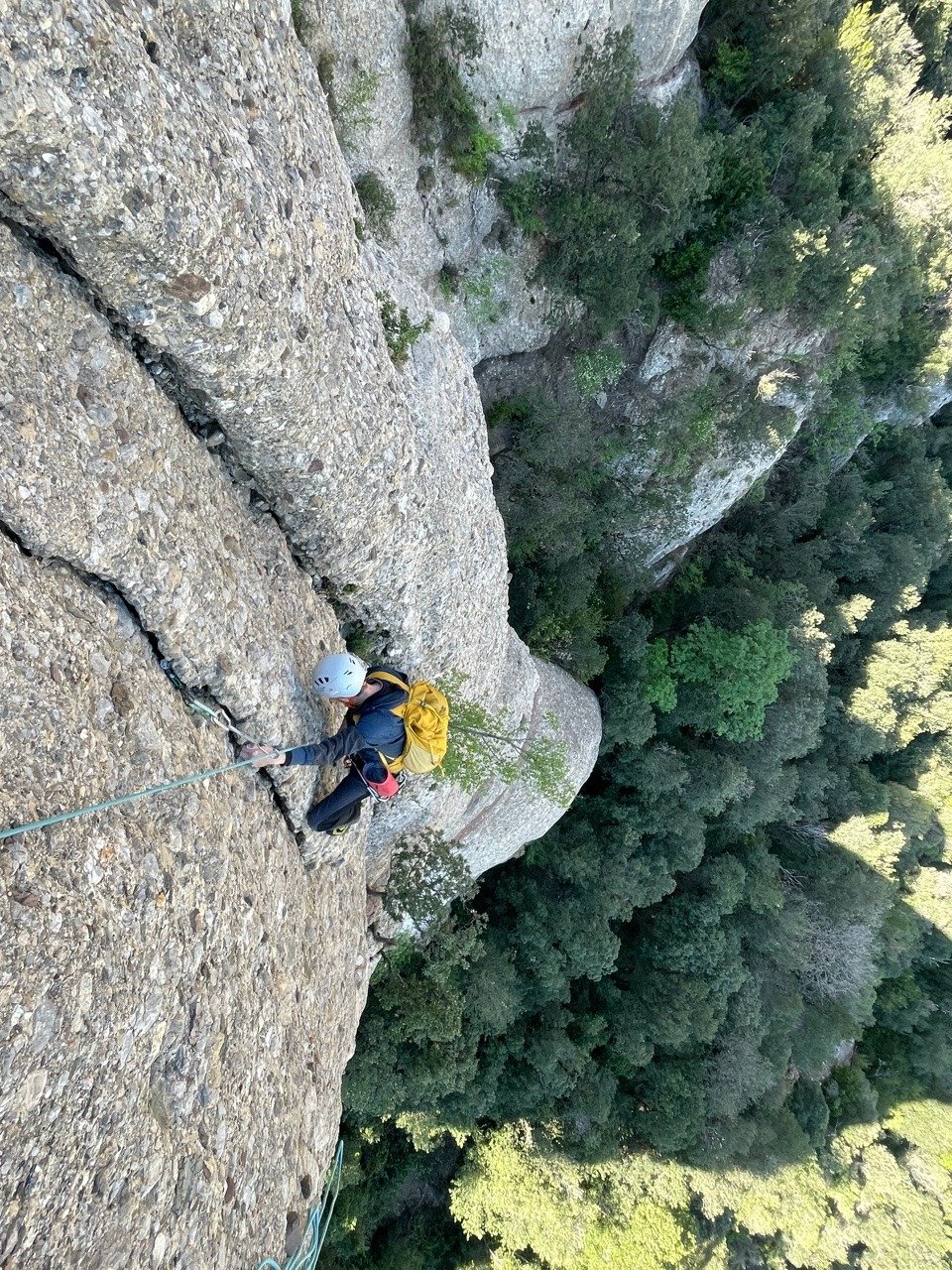 Climber scaling a rock in Catalonia