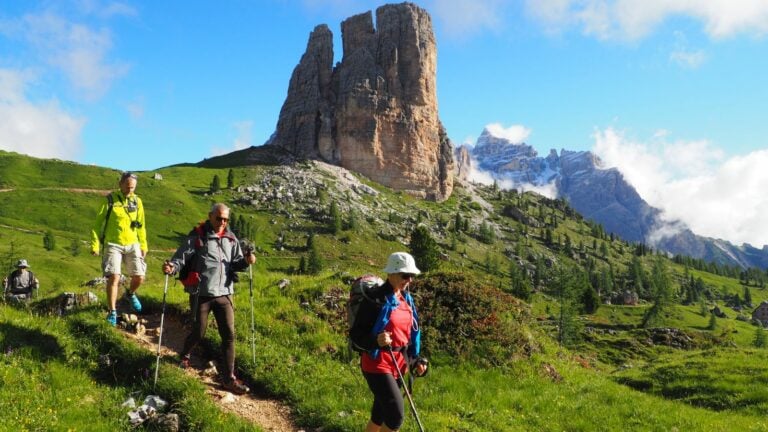 Hiker near Torre Grande in the Dolomites.