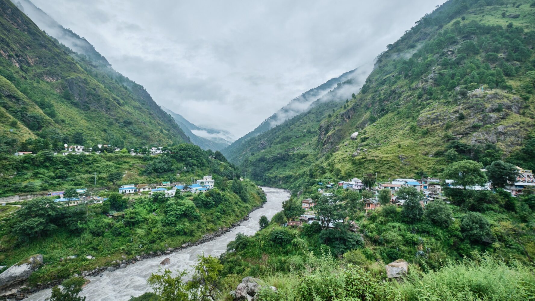 Lush landscapes and a river in the Himalayas, near Syabrubesi, Nepal.