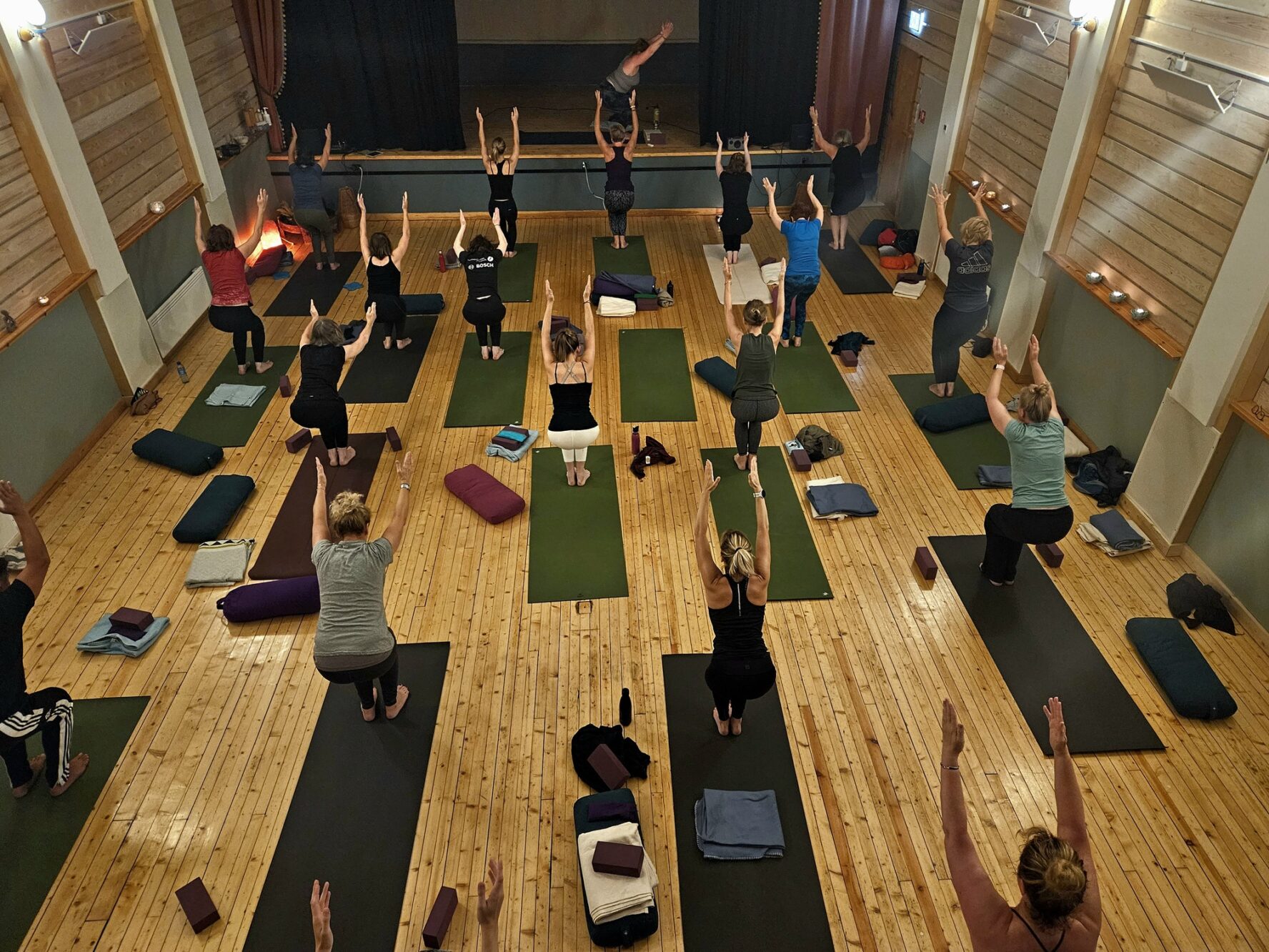 Practicing yoga in a studio