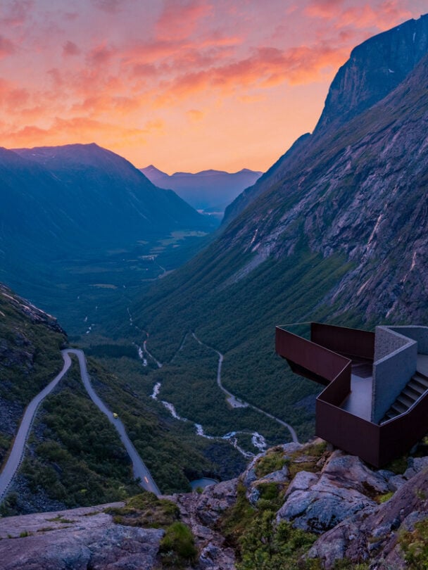 Hikers admiring Norwegian mountains