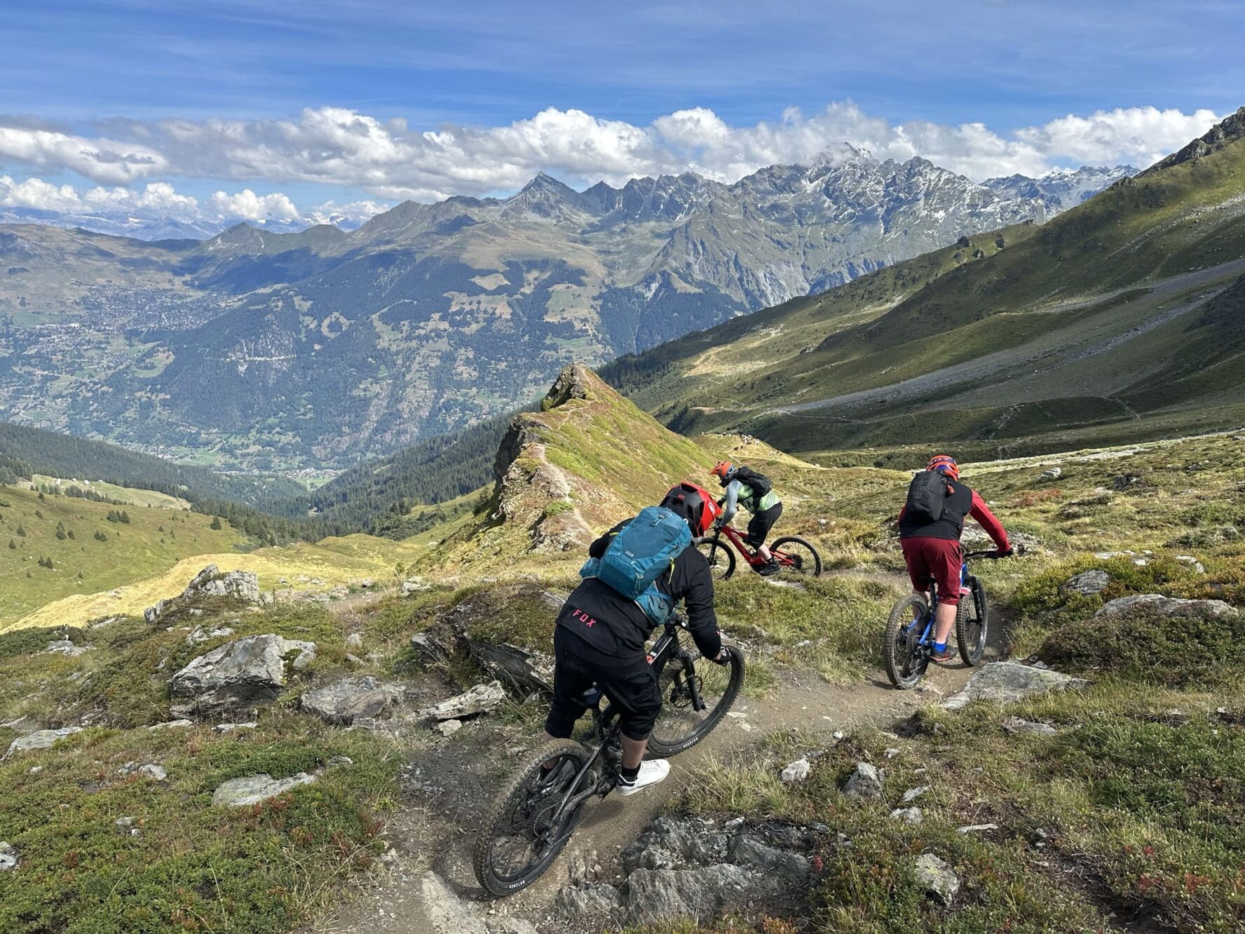 Three MTBers around Verbier in the mountains