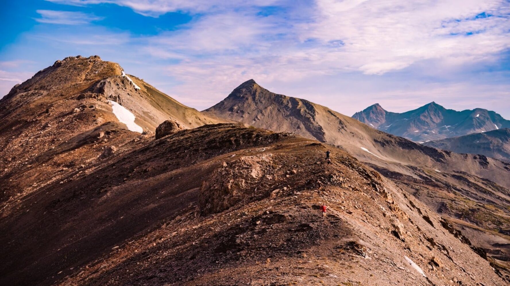 Aerial view of a hiker in the Canadian Rockies, near the Purcell Mountain Lodge.