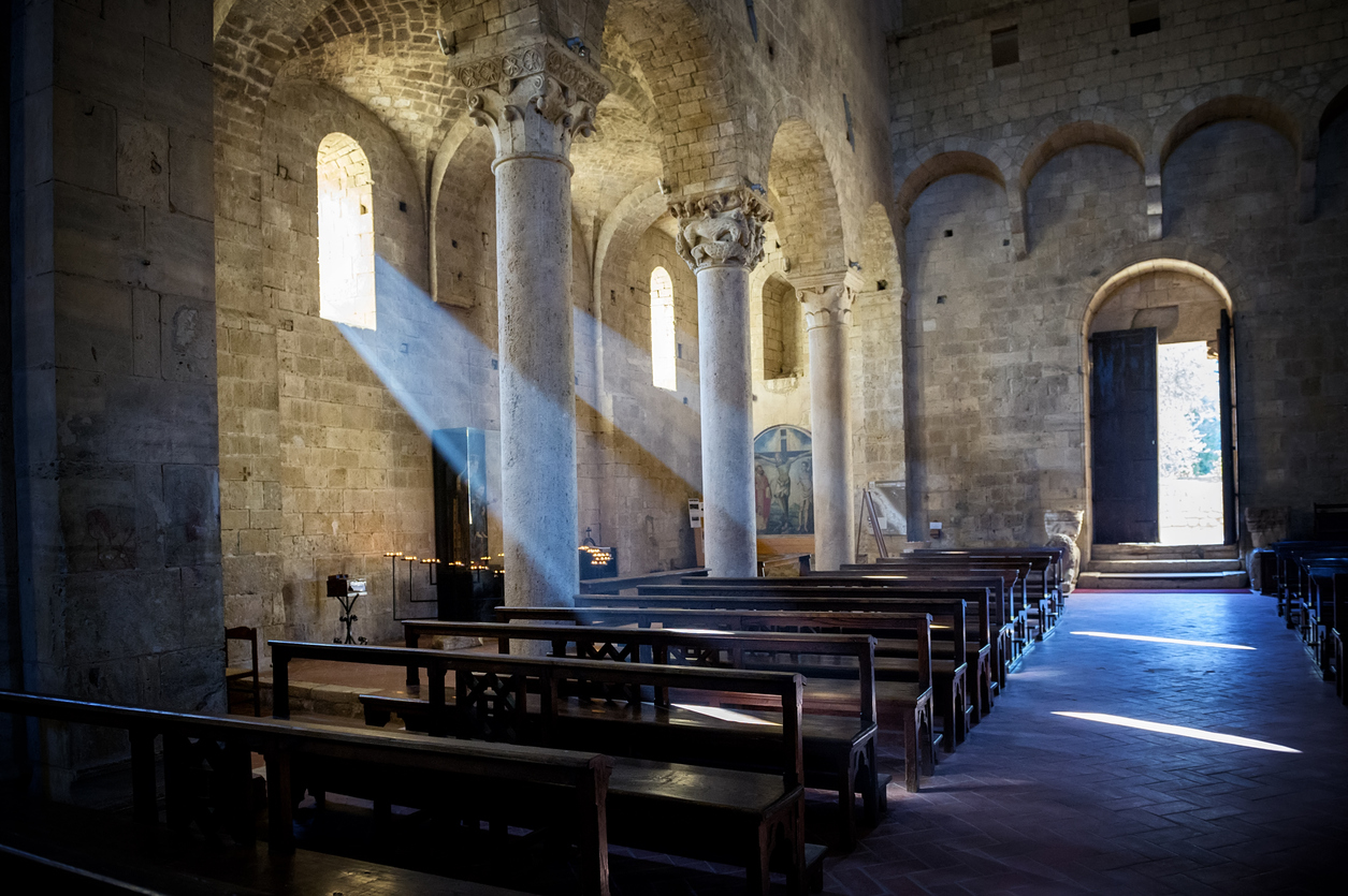 Church interior of the Romanesque church of Sant’Atimo, Val d’Orcia, Tuscany.