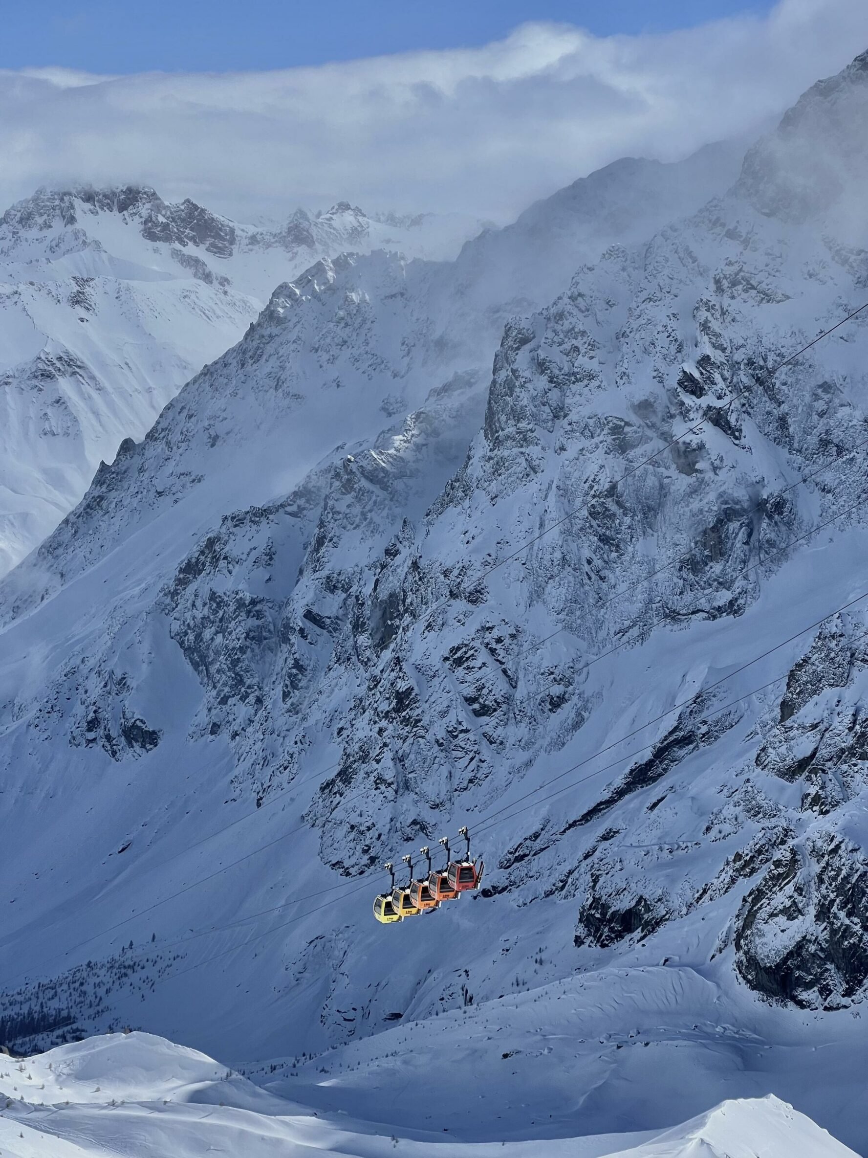 Ski lifts amid Alpine wilderness, France.