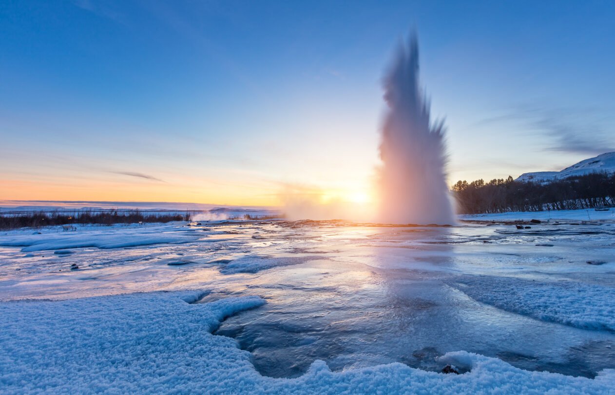 Famous Geysir in Iceland in beautiful sunset light. One of the most famous natural heritage on Iceland.