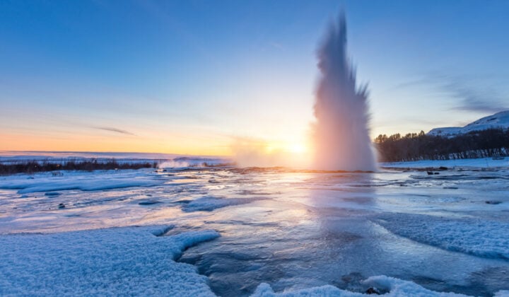 Famous Geysir in Iceland in beautiful sunset light. One of the most famous natural heritage on Iceland.