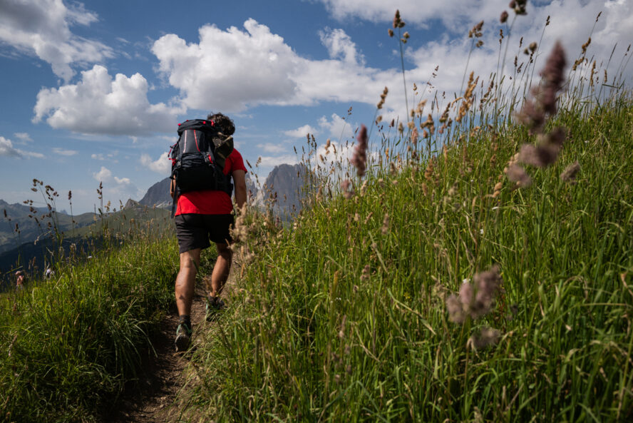 Hiker in the Dolomites in the summer