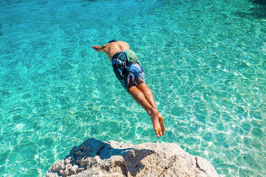 Jumping into sea, Sardinia