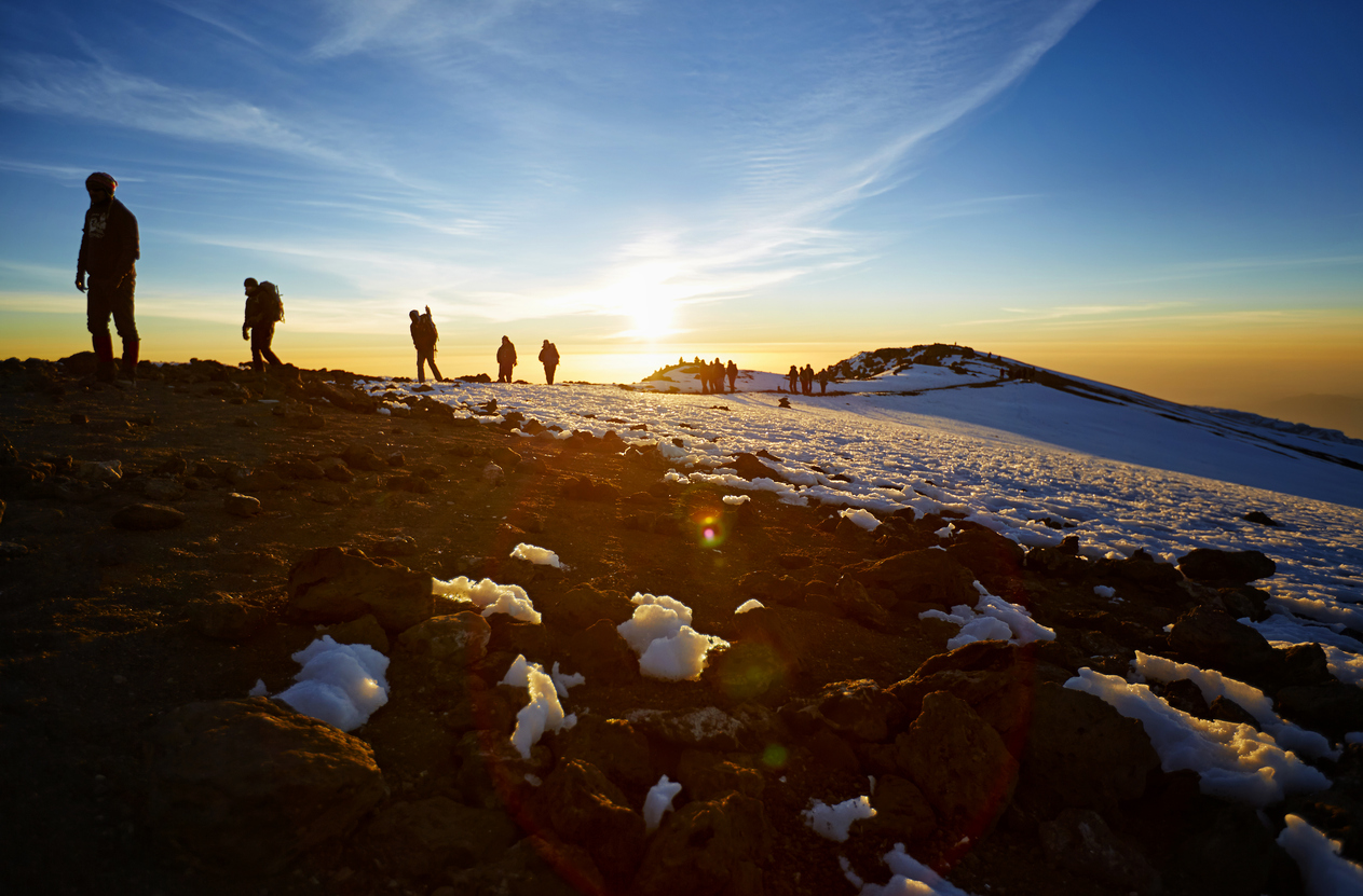 Mt Kilimanjaro route to the summit, a number of people climb the last stretch to the top