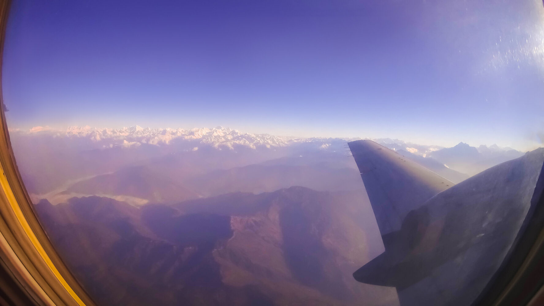 Views of the Himalayas from a plane window, in Nepal.