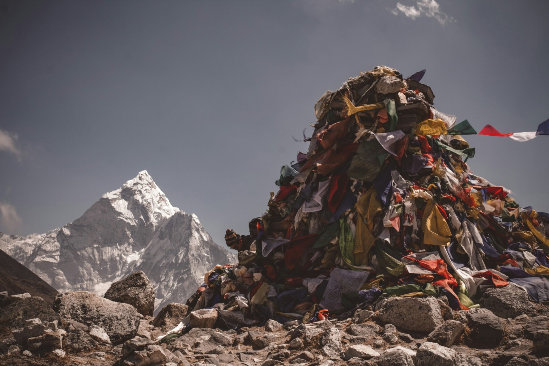 Prayer flags and Mount Everest in the distance.