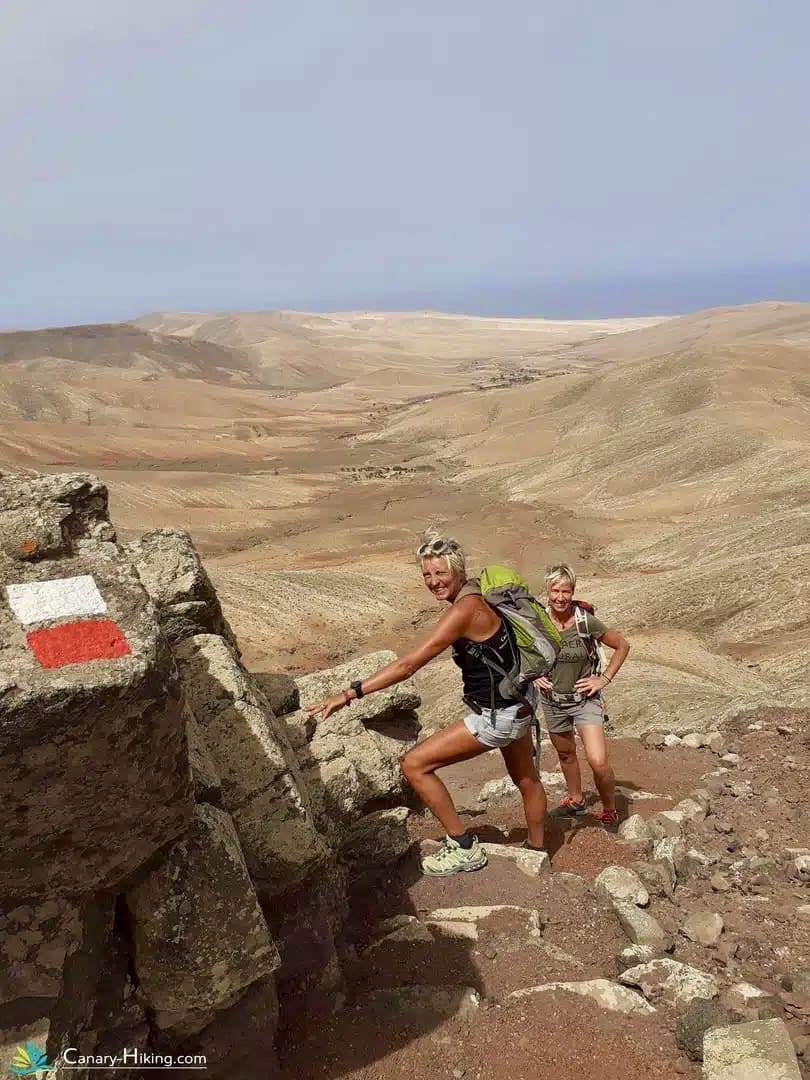 Rugged landscapes and Fuerteventura hikers