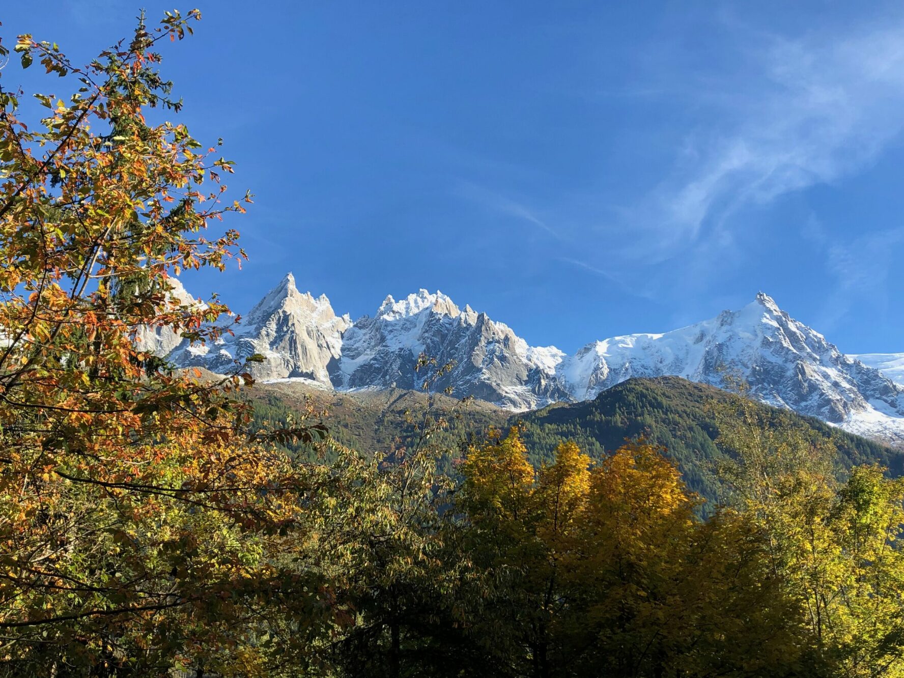 Sharp, snow-covered Alpine peaks seen in fall in the Chamonix area.