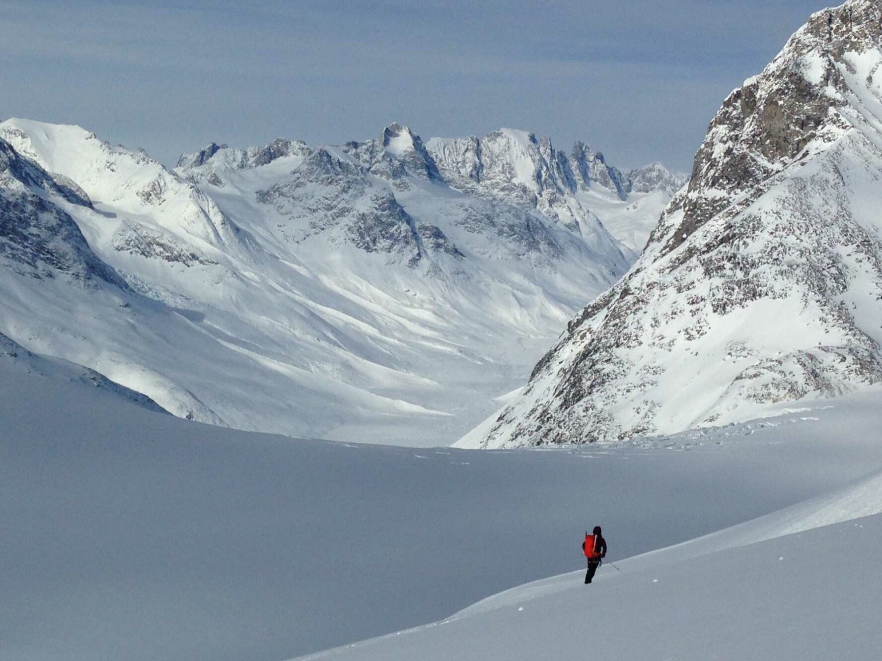 Skier in a vast wilderness of Greenland