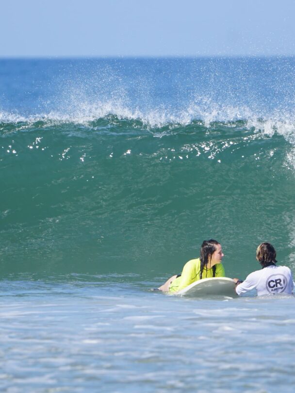 Surfing and riding waves in Tamarindo