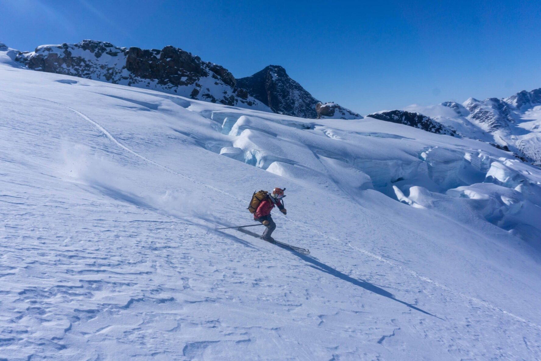 One skier going down the slope in West Greenland
