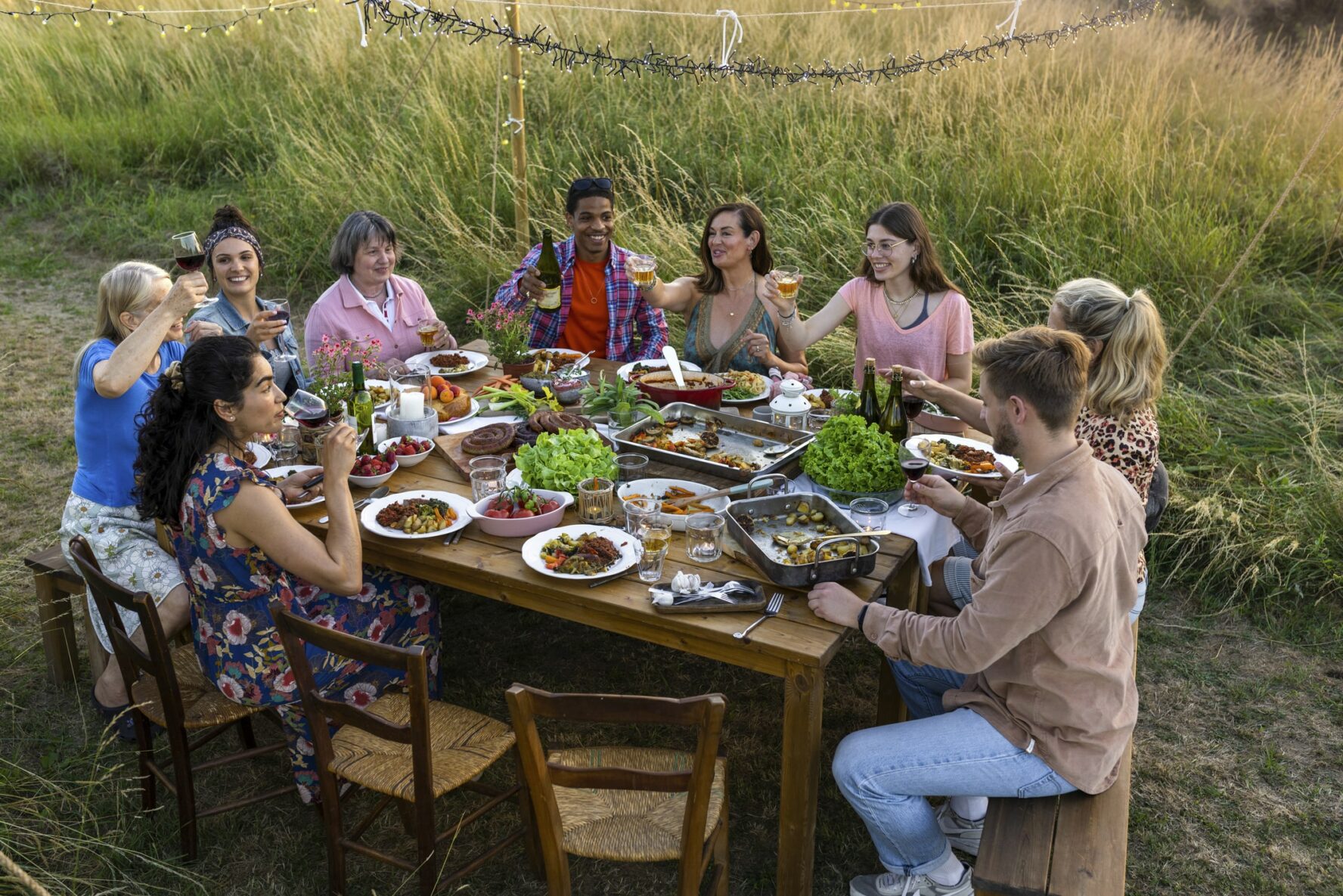 Visitors toasting and enjoying local food in Burgundy
