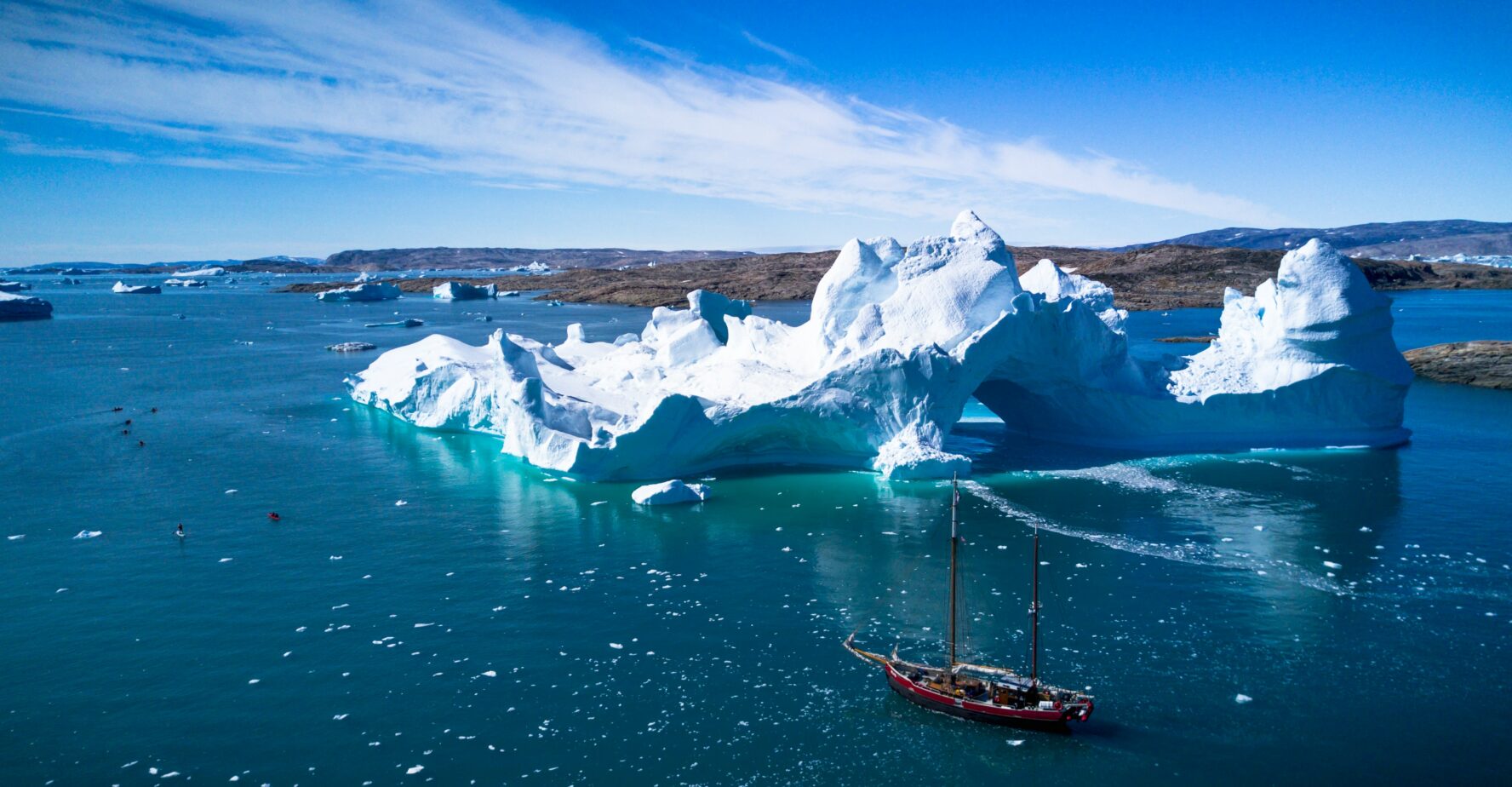 A sailing yacht and a beautiful vista in Greenland