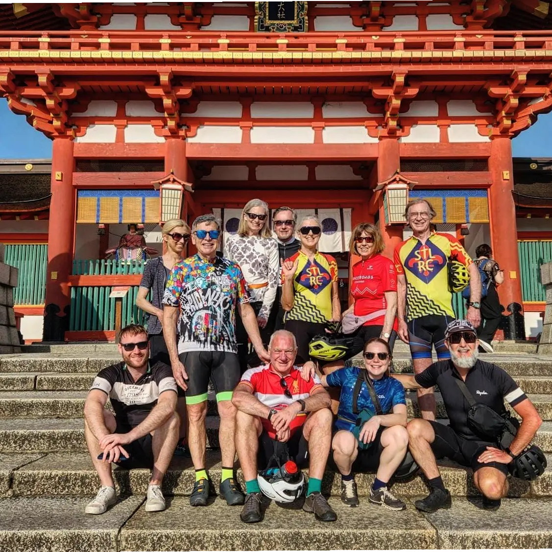 Bikers posing for a farewell photo in Kyoto, Japan