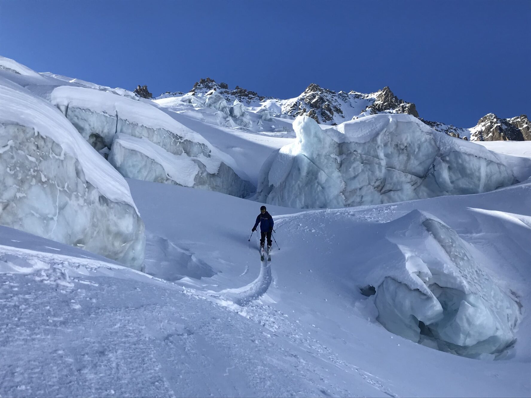 Skier in deep snow in Alps