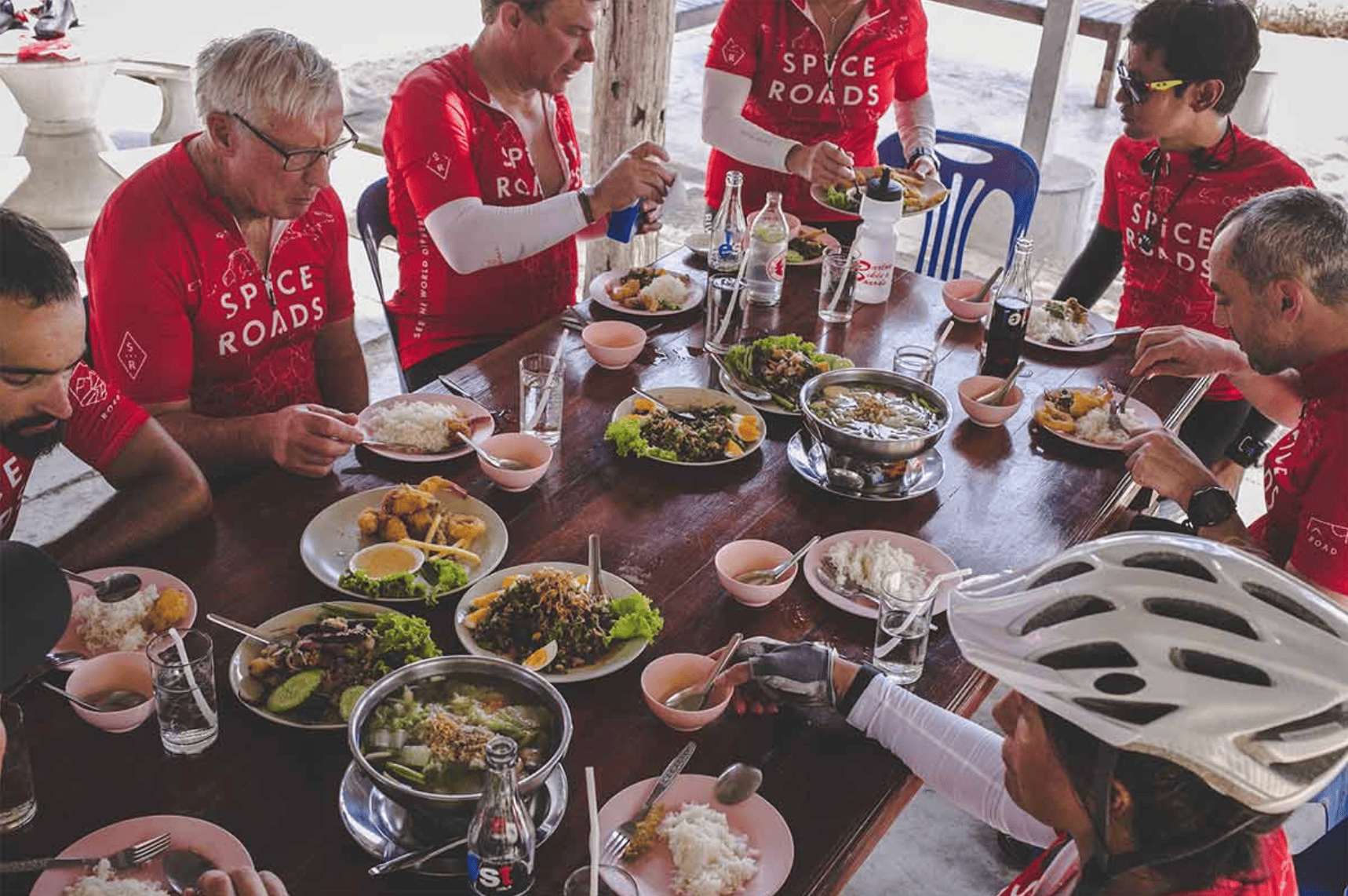 Cyclists enjoying Thai food