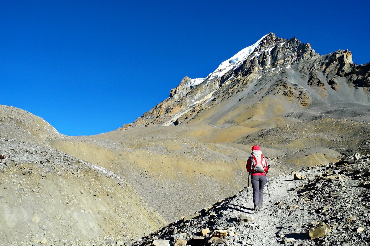 Girl walking towards Thorong La Pass, Nepal
